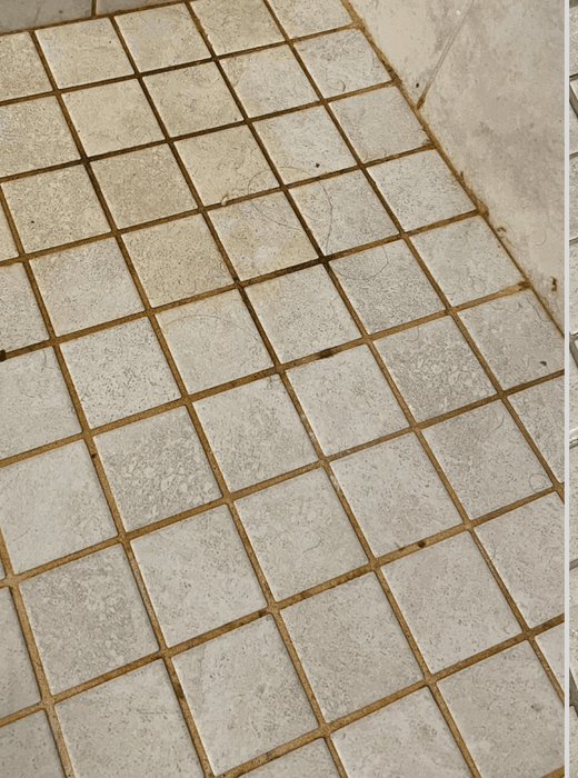 Dirty grout line close-up showing the ugly detail Bathroom Restore focuses on.