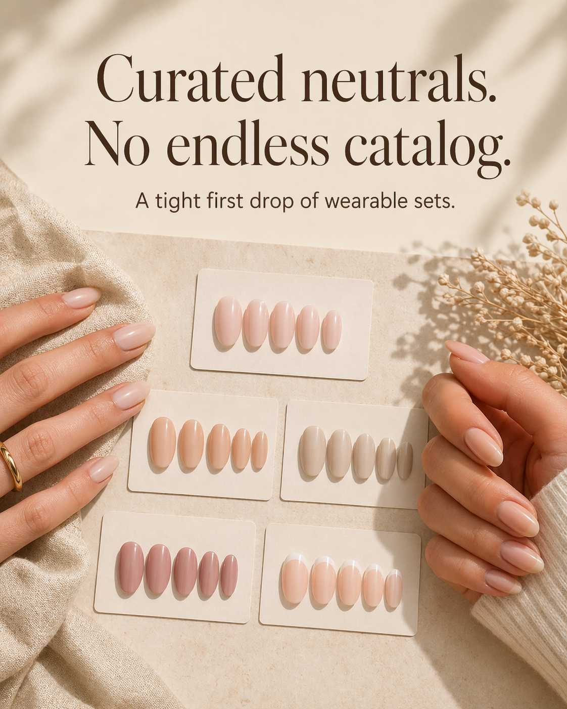 Curated neutral press-on nail shade cards with polished hands and warm editorial styling